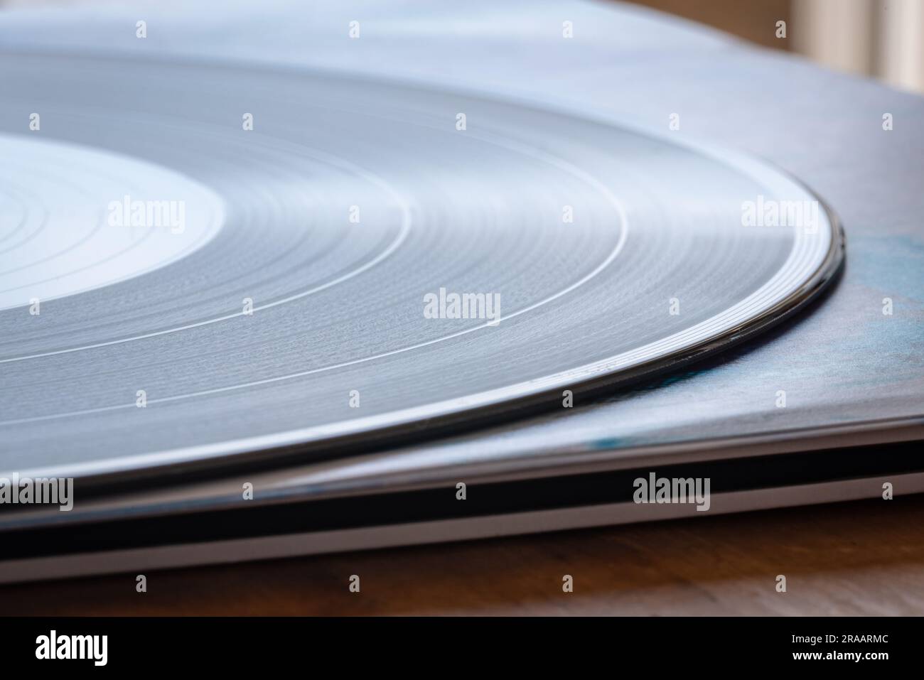 Close up image of vinyl record on tabletop Stock Photo