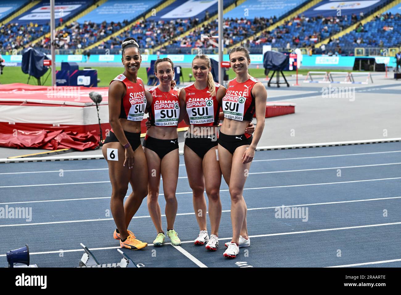 CHORZOW, POLAND - JUNE 24: Lena Weiss, Salome Kora, Geraldine Frey, Celine Burgi of Swizerland pose for a photo after win’s in the Women's 4 x 100m Re Stock Photo