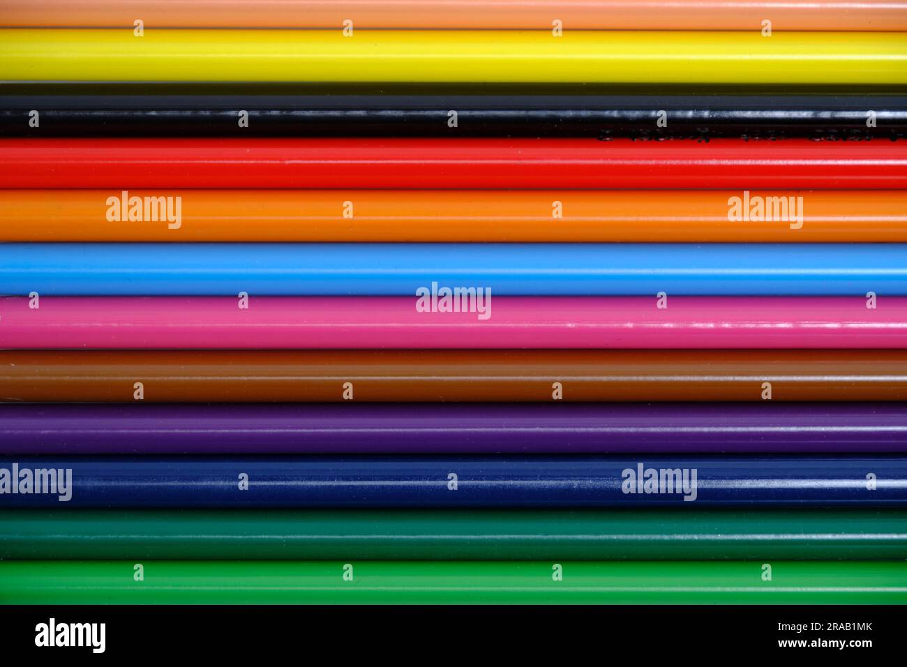 Linear multicolored background of bright colored pencils Stock Photo
