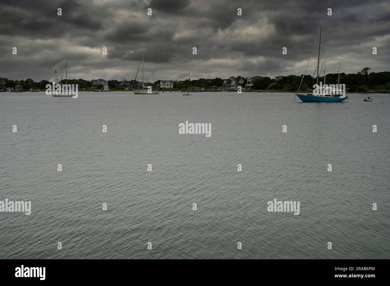 UNITED STATES June 2023 Storm clouds gather over Silver Lake Harbor