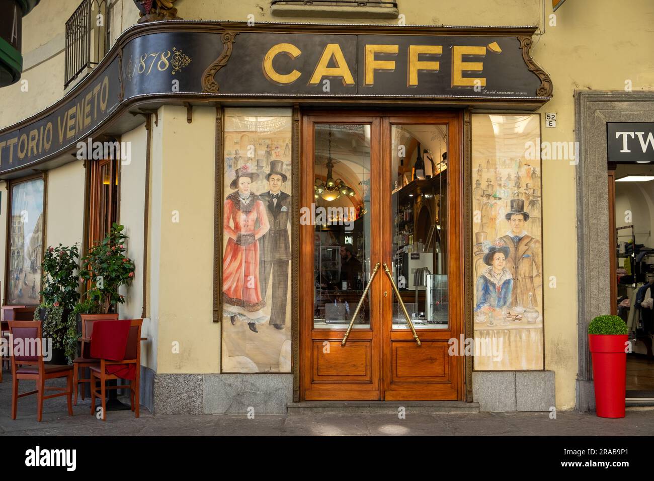Cafe Vittorio Veneto opened in 1878 with paintings and outdoor seating, Turin, Italy Stock Photo