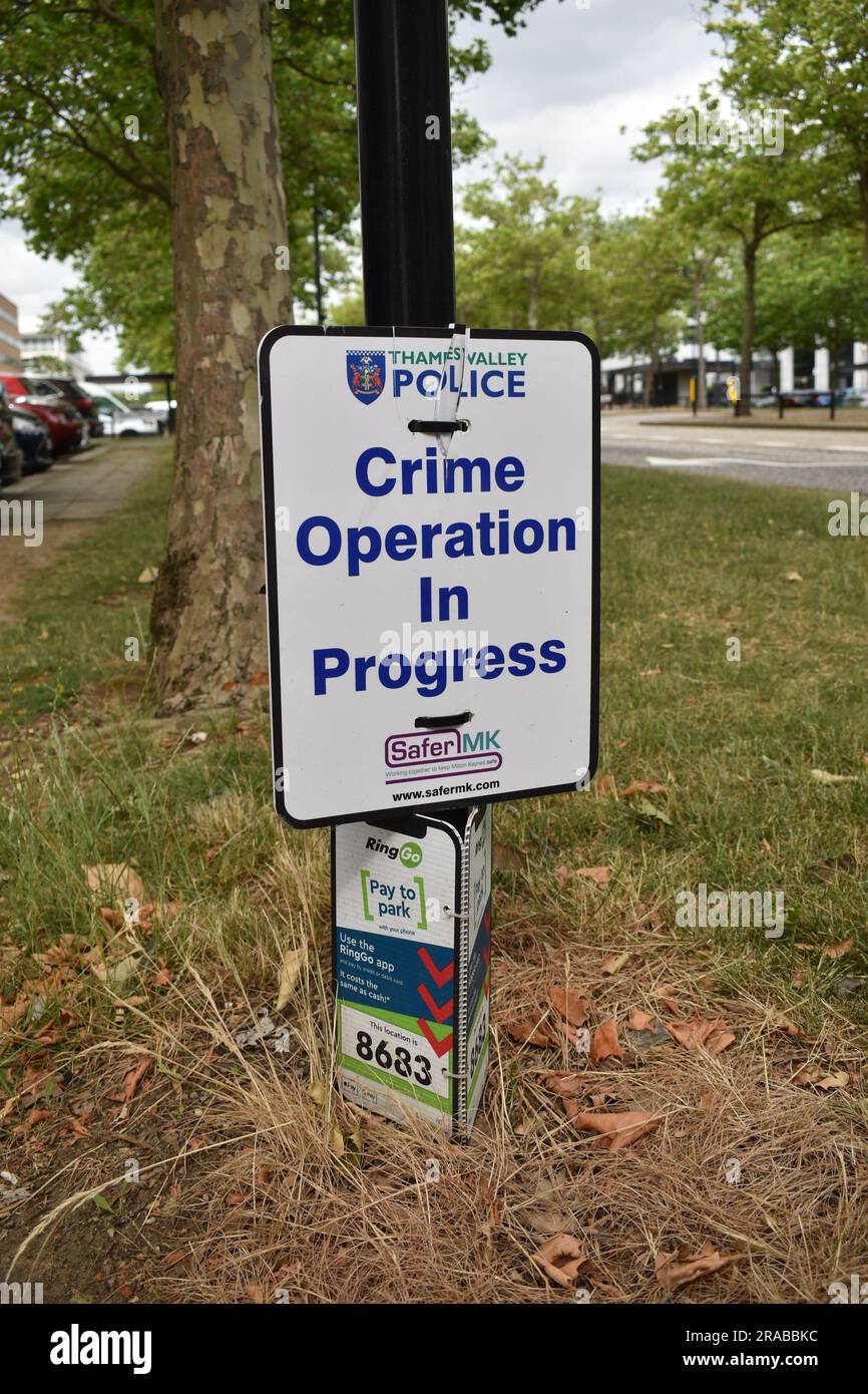 Sign by Thames Valley Police: 'Crime Operation in Progress'. Stock Photo
