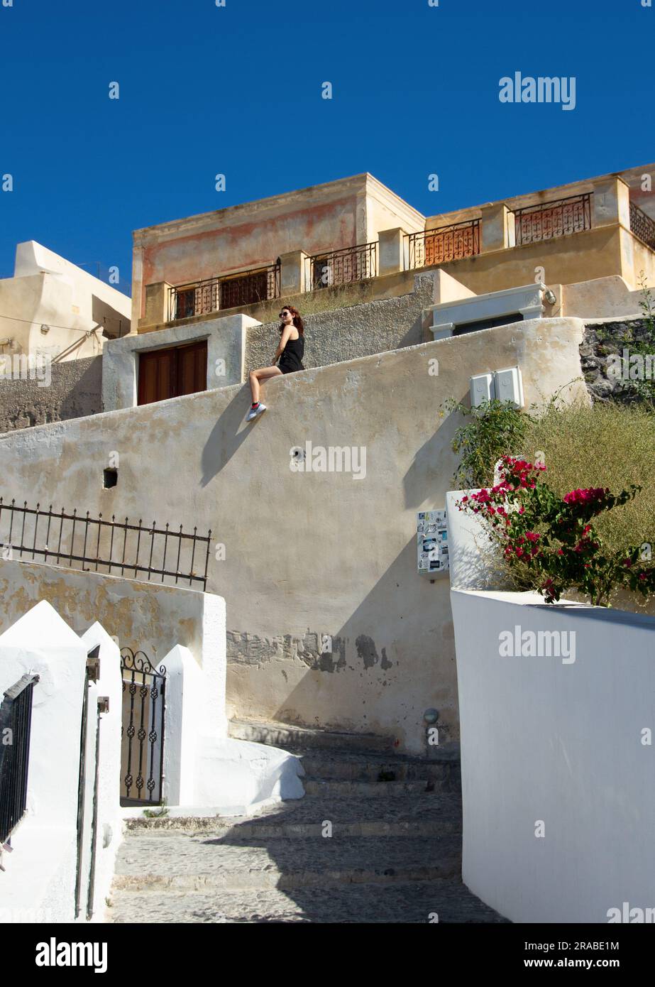 Girl on the wall Stock Photo - Alamy