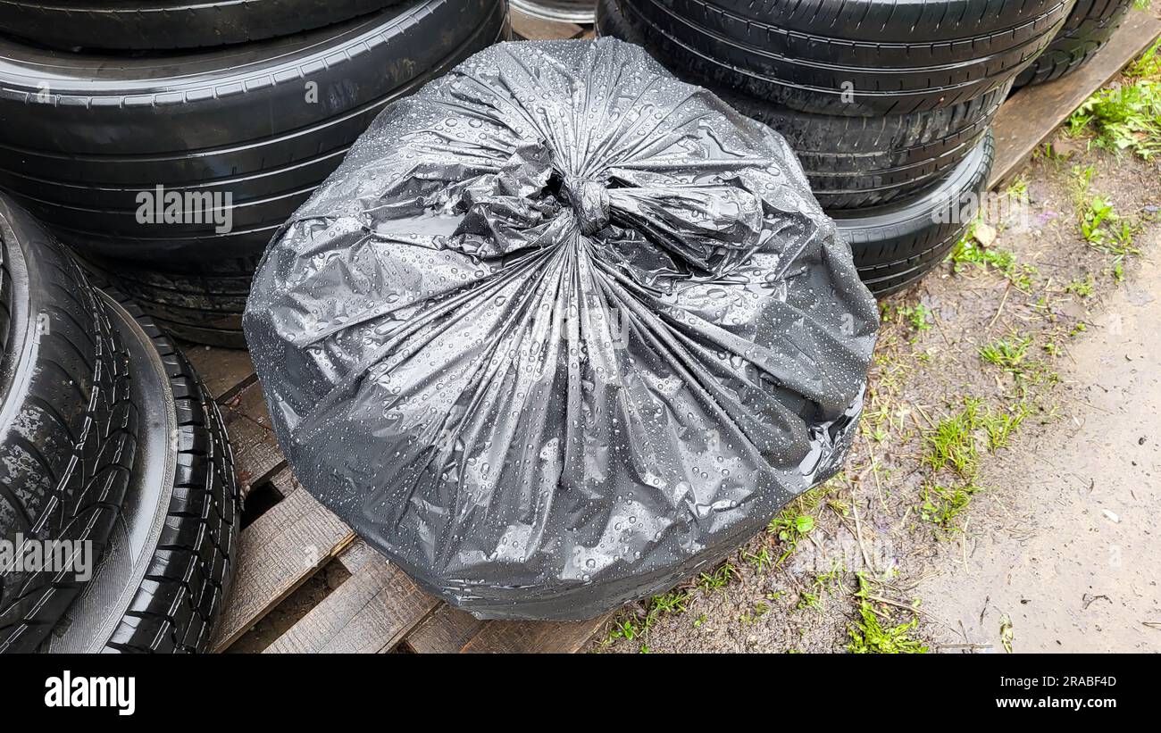 Landfill with old tires and tires for recycling. Disposal of used tires