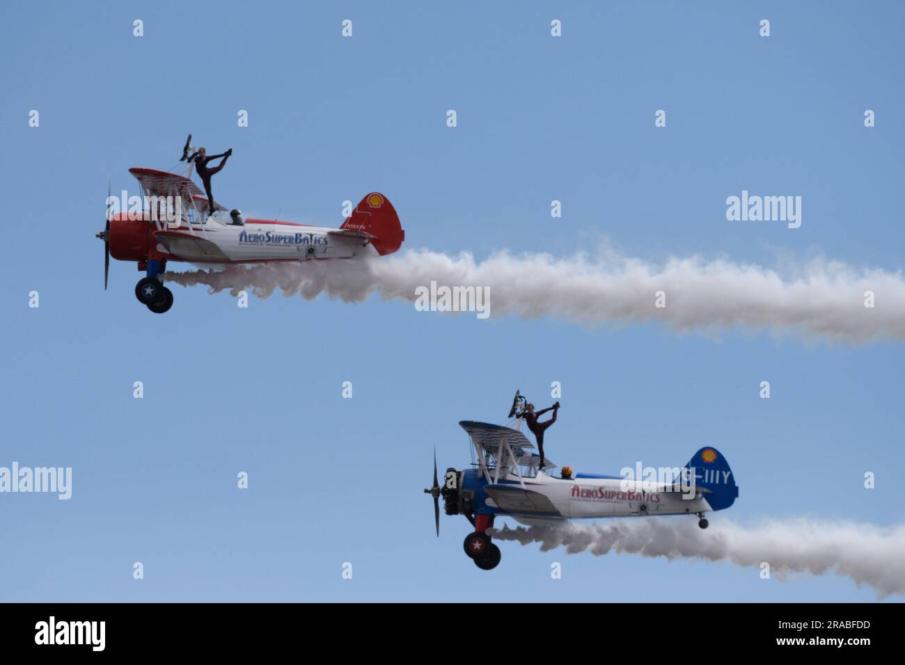 Wales National Airshow, Swansea, South Wales, UK  2 July 2023.  Aerosuperbatic Wingwalkers perform for the crowds on the 2nd day of the airshow.  The annual event brings over 200,000 people every year.  Credit: Andrew Bartlett/Alamy Live News Stock Photo