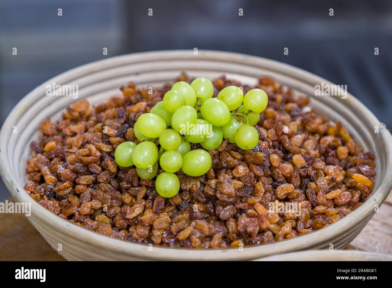Production of an original Dresden Christstollen in Dresden, Germany. Raisins for Dresden Christmas Stollen come from the light, seedless grape variety Sultana. Countries of origin are Turkey or Australia Stock Photo