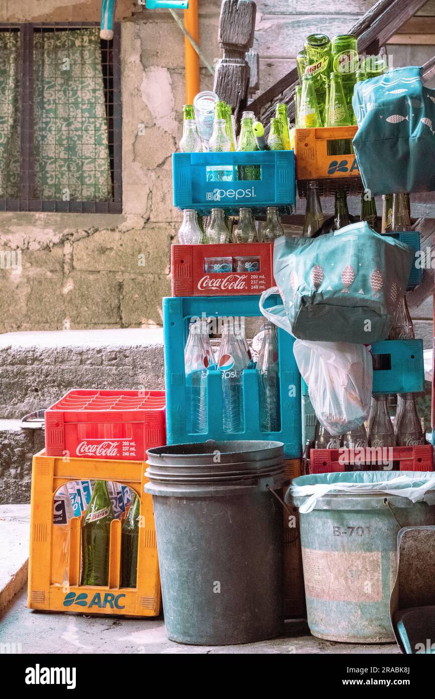 Stacked boxes of glass bottles in Olongapo, Zambales, Philippines Stock Photo