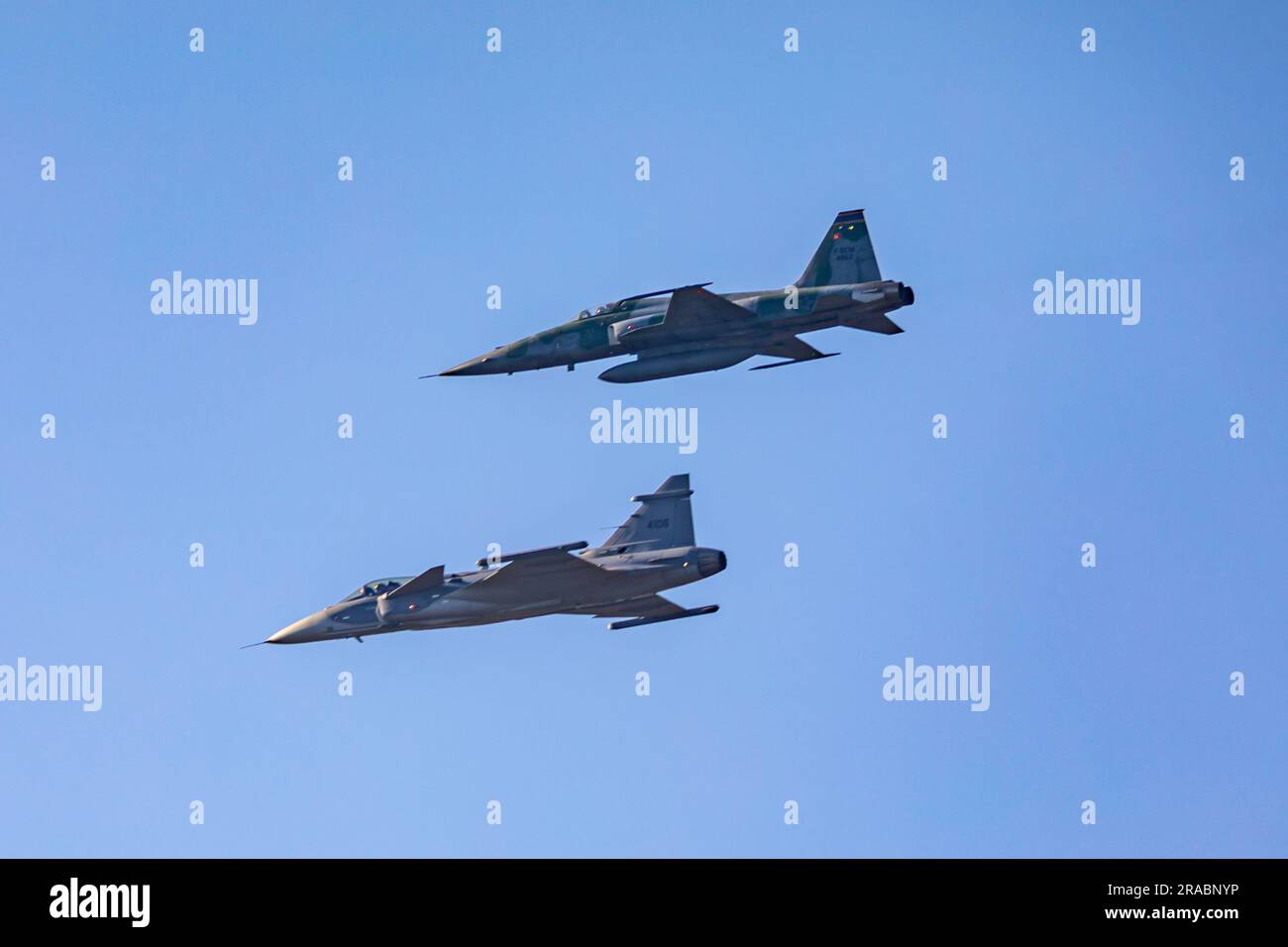 Two Brazilian Air Force fighter planes, One F5 and one Gripen Stock Photo