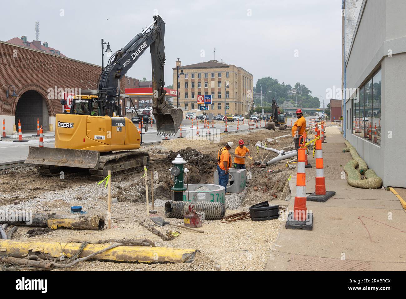 Workers building storm sewers on Main Street in Burlington, Iowa as
