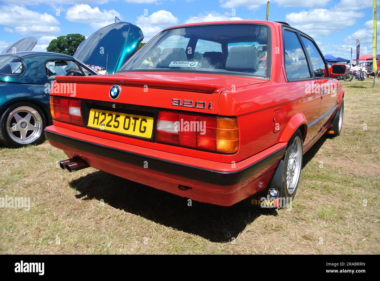 A 1991 BMW 320i parked on display at the 47th Historic Vehicle Gathering, Powderham, Devon, England, UK. Stock Photo