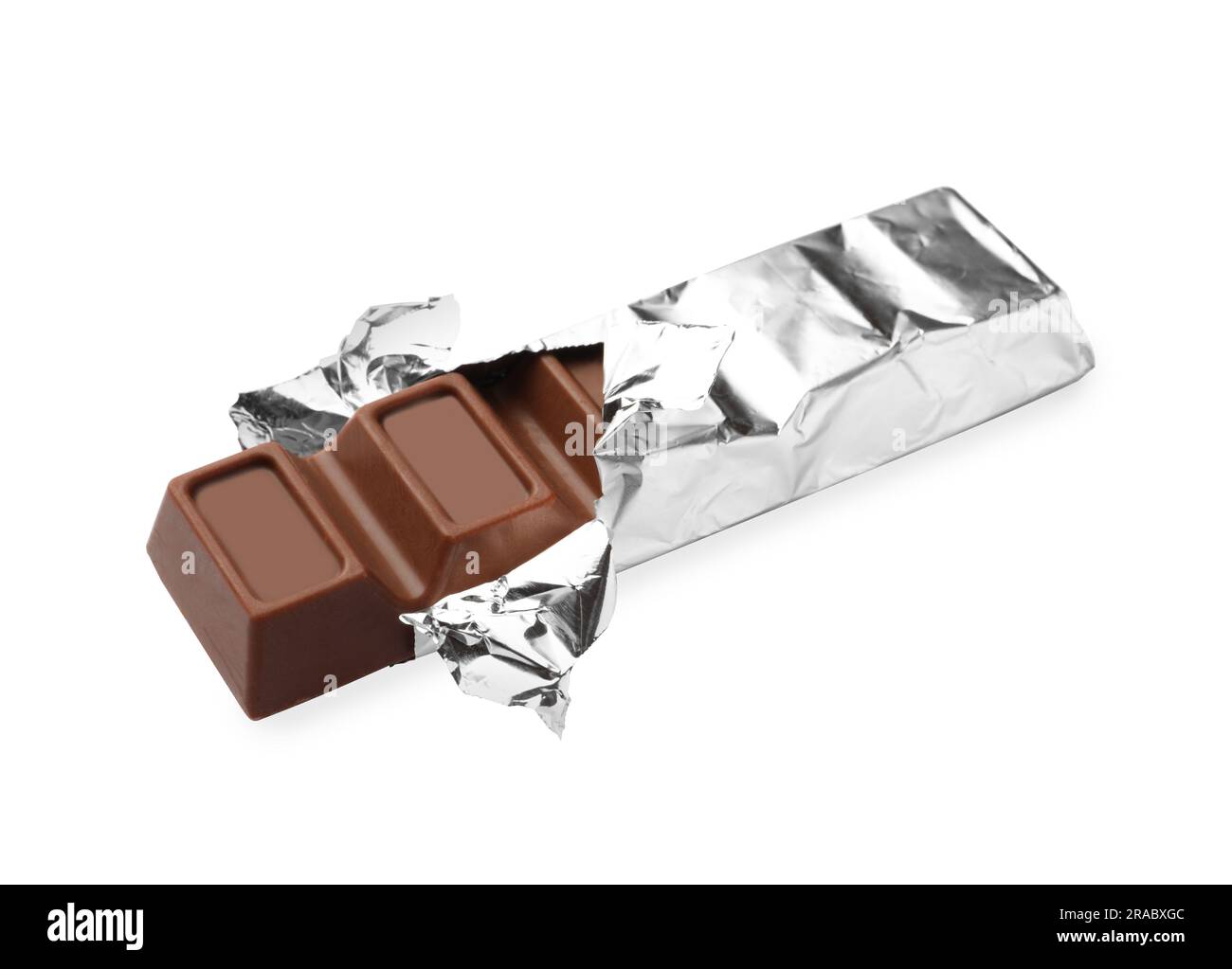 Delicious chocolate bar wrapped in foil on white background Stock Photo