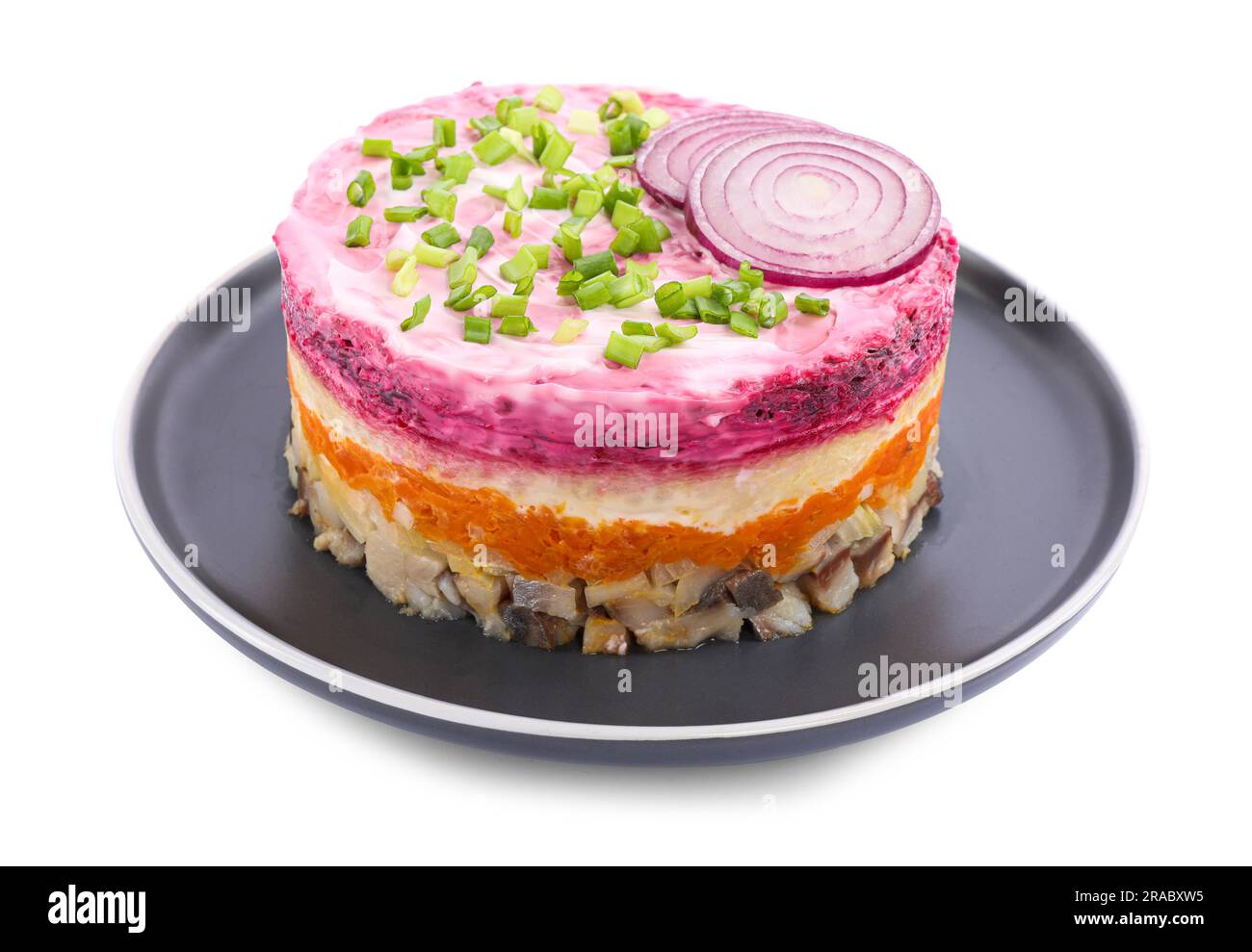 Herring under fur coat salad isolated on white. Traditional Russian