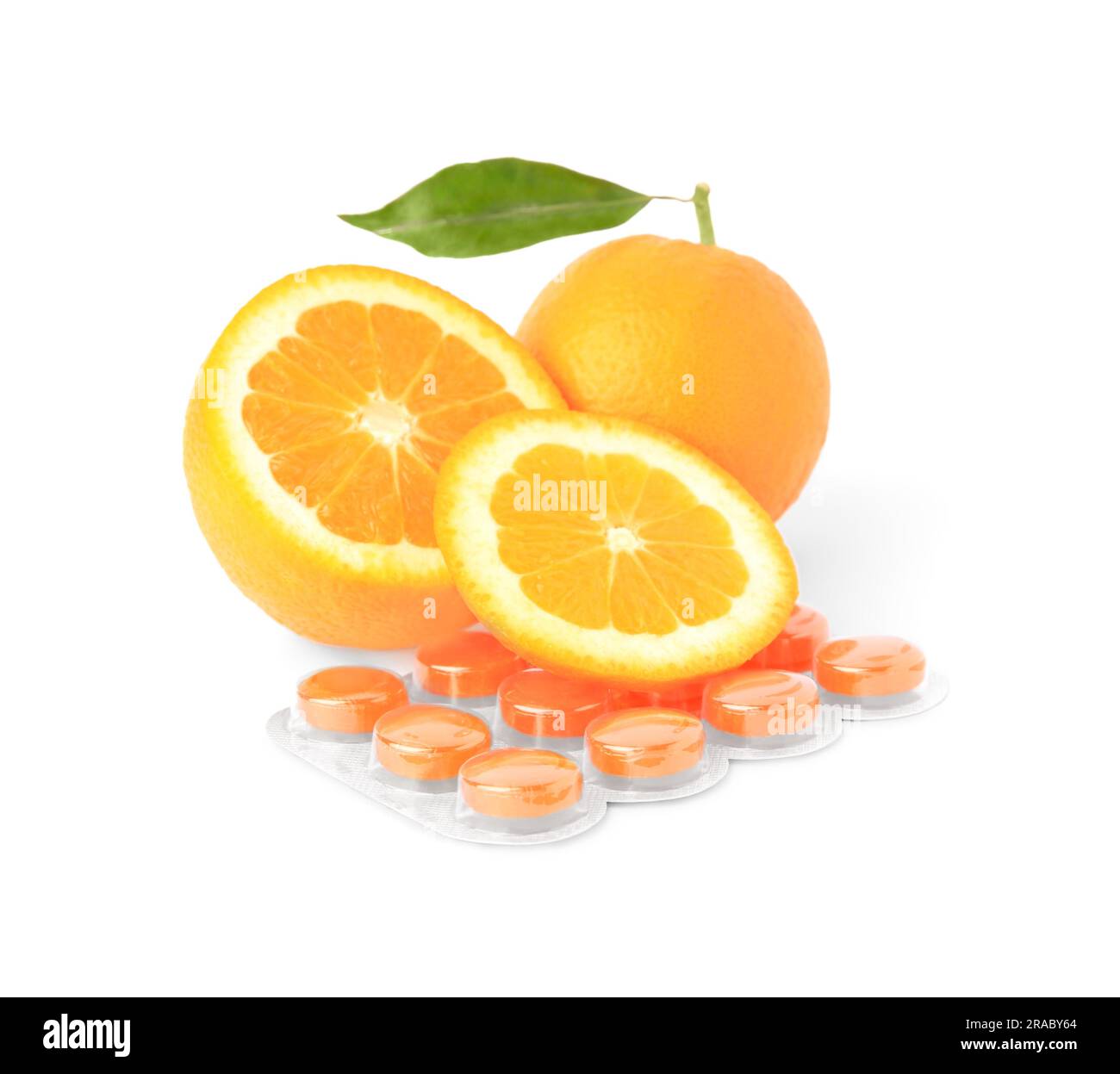 Fresh oranges and blister with cough drops isolated on white Stock