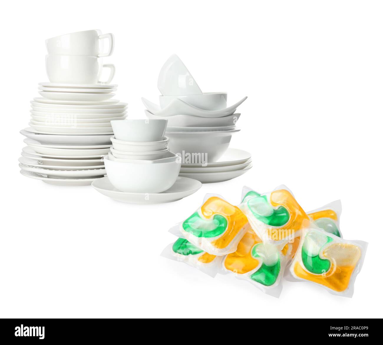 Dishwasher pods and stacked clean tableware isolated on white Stock