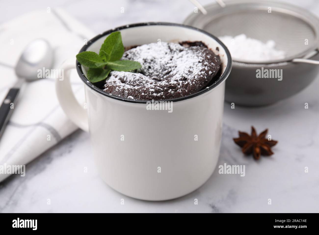Tasty chocolate mug pie on white marble table, closeup. Microwave cake  recipe Stock Photo - Alamy