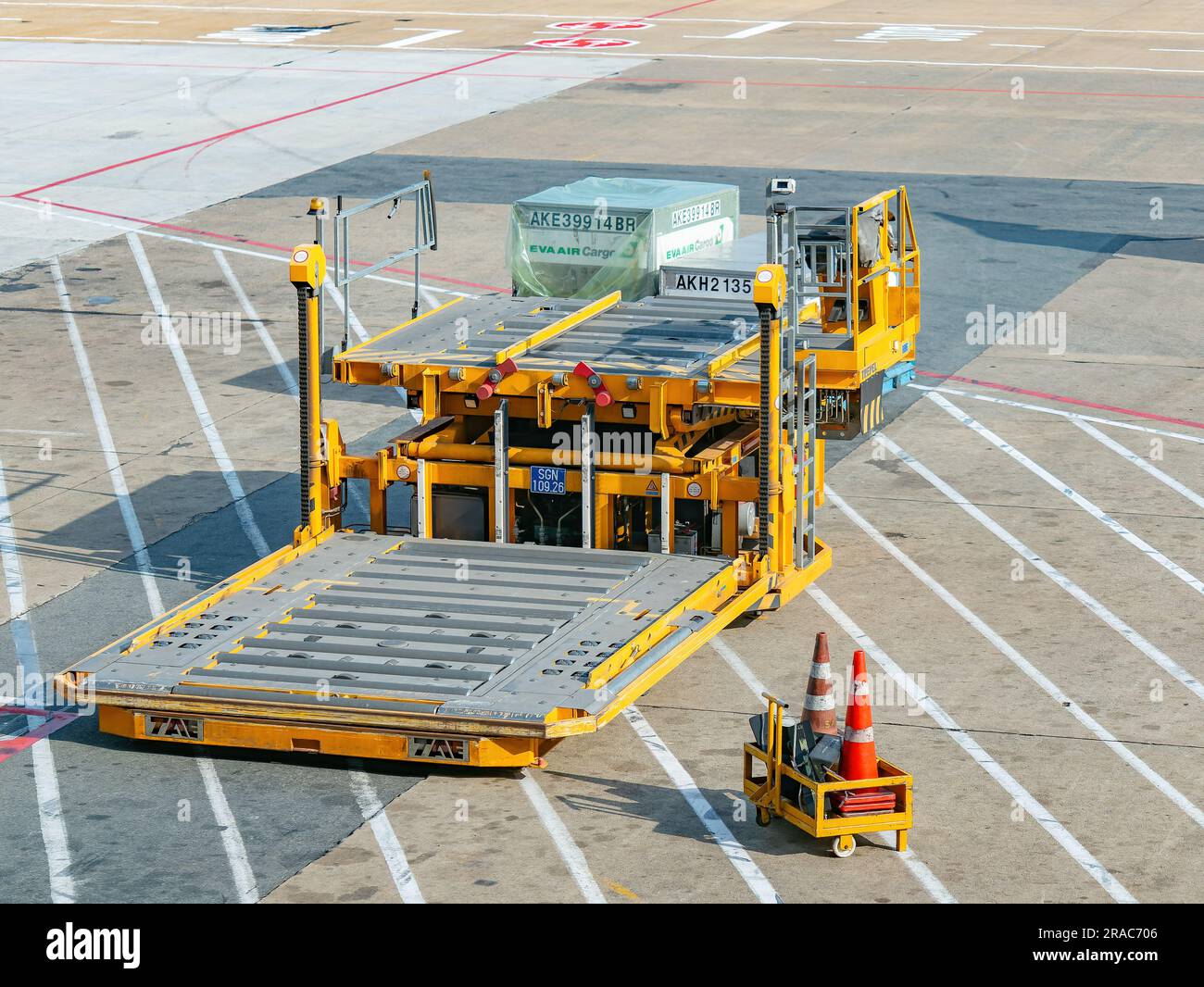 Ho Chi Minh City, Vietnam - April 13th 2018: Container pallet loader at Tan Son Nhat Airport in Ho Chi Minh City, Vietnam. The loader is being used to Stock Photo