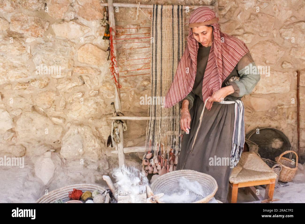 Hannah the Weaver portrays a first century woman preparing wool to be ...