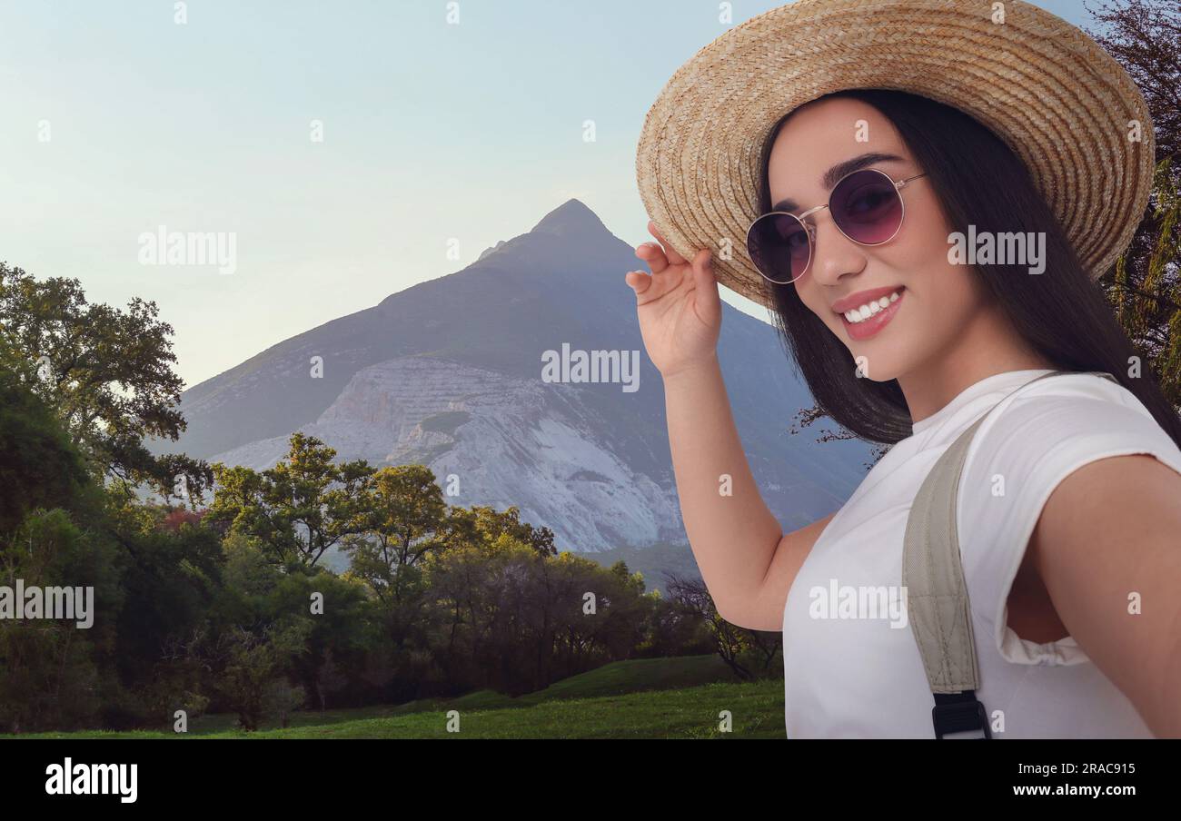Woman hiker in straw hat hi-res stock photography and images - Alamy