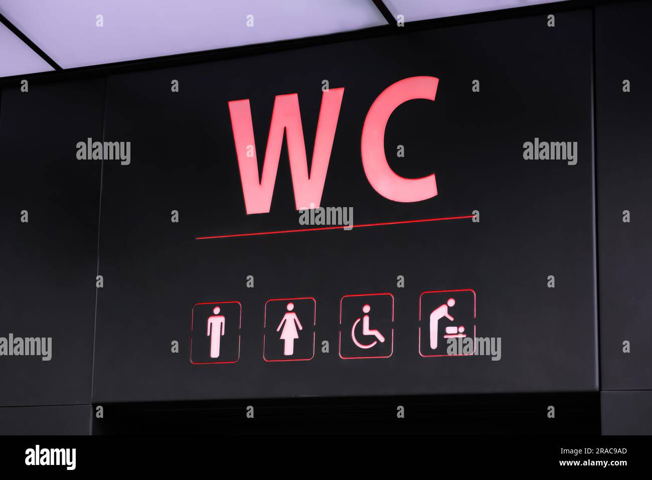 Sign of public toilet with different symbols Stock Photo Alamy