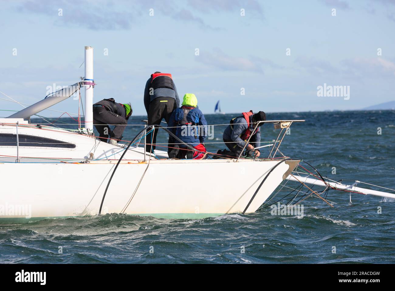 A yacht loses her mast during Race 1 of the Winter Series held in choppy seas in Port Phillip Bay, Melbourne Stock Photo