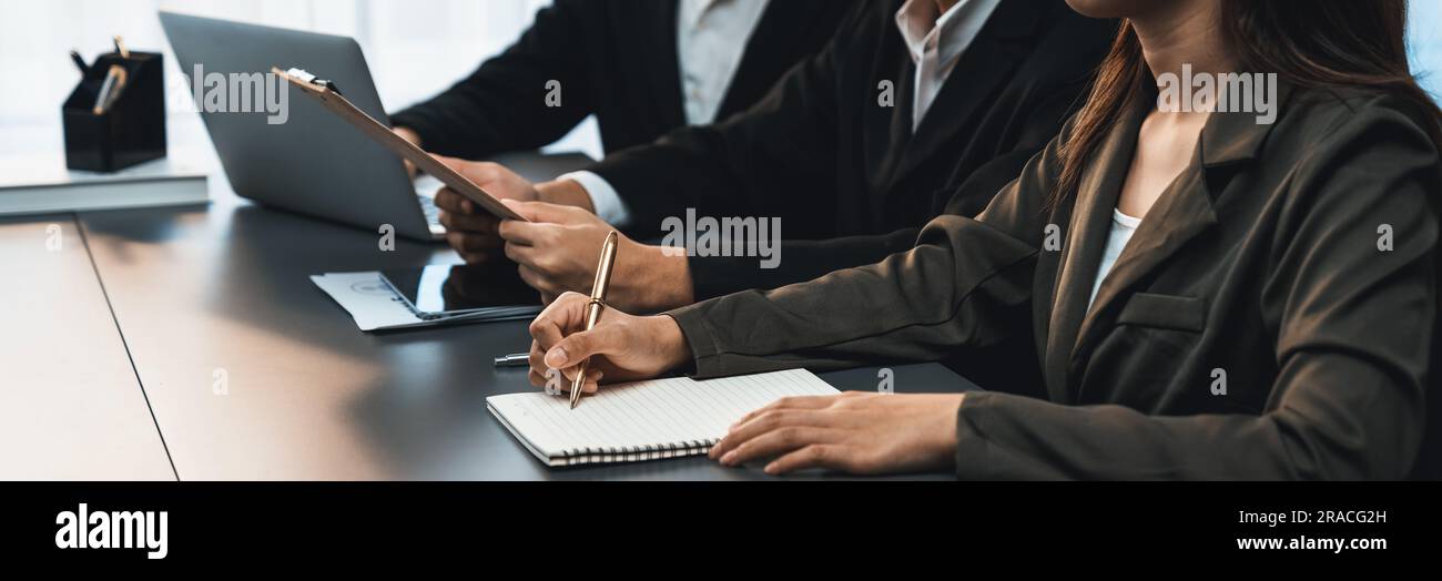 Candidate and interviewers discuss work experience and qualifications