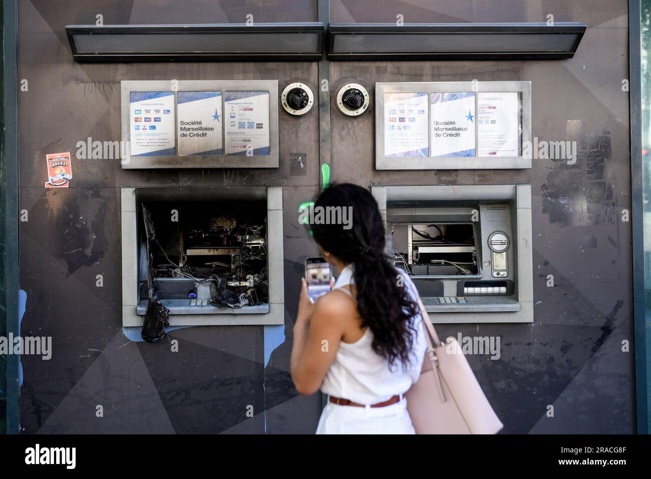 Marseille, France. 02nd July, 2023. A young woman captures the ...