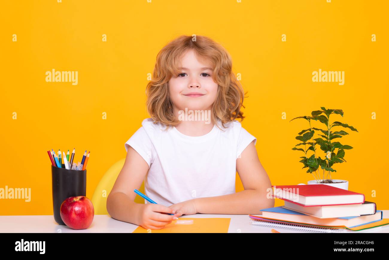 Back to school. Funny little child from elementary school with book. Education. Kid study and learning Stock Photo
