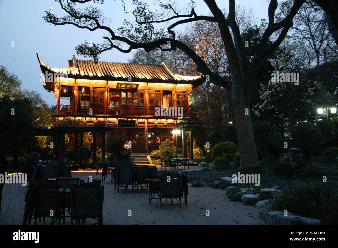 Well lit Tea House in the evening on West Lake in Hangzhou China Stock Photo