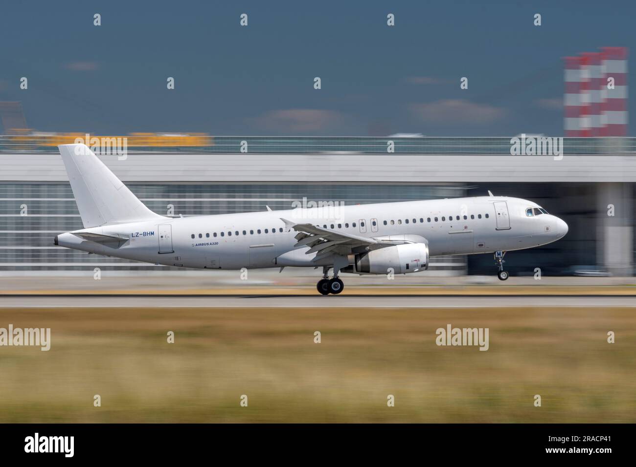 Munich, Germany - June 29. 2023 : Balkan Holidays Air Airbus A320-232 with the aircraft registration LZ-BHM during landing to the southern runway 26L Stock Photo