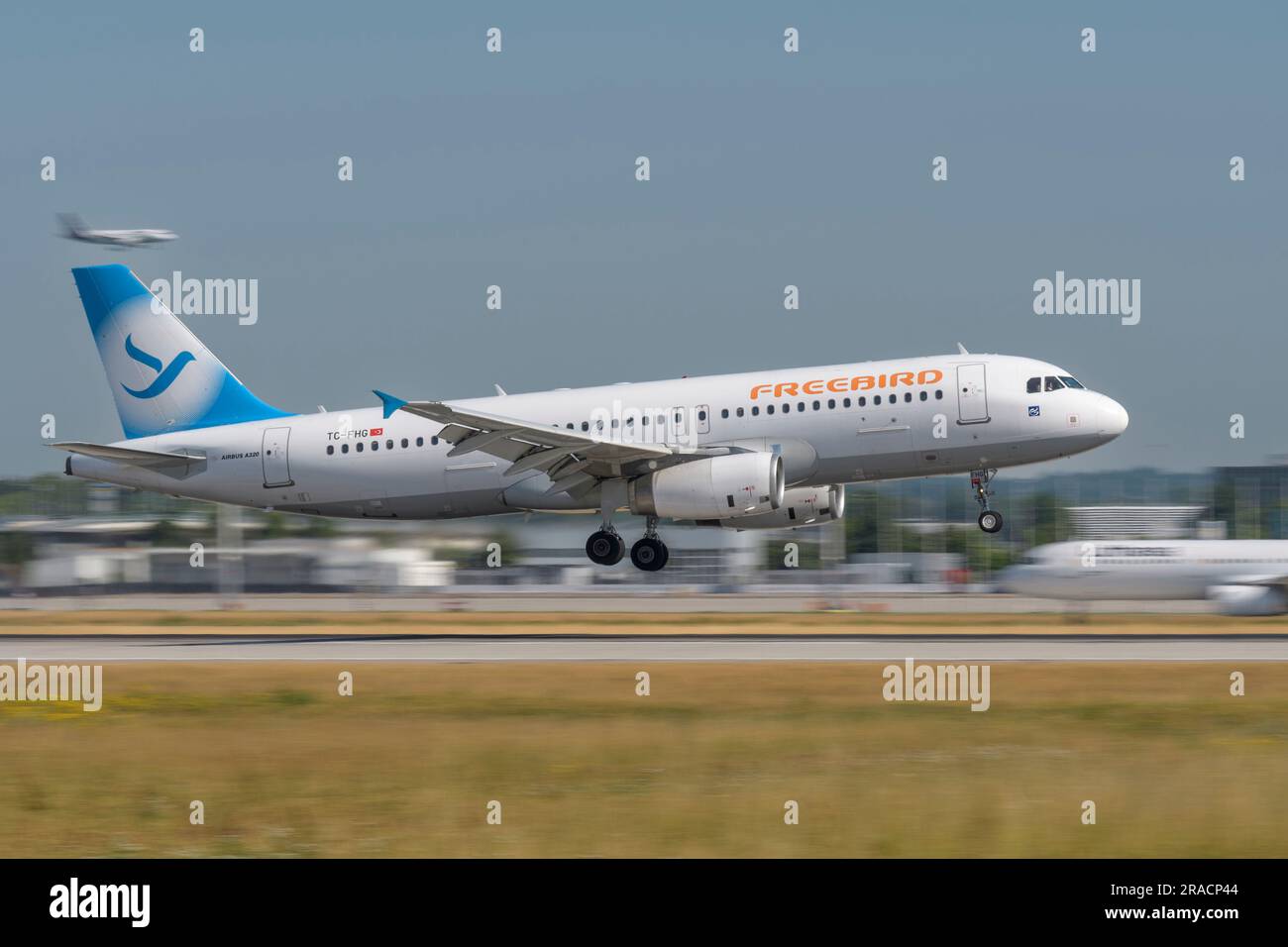 Munich, Germany - June 29. 2023 : Freebird Airlines Airbus A320-232 with the aircraft registration TC-FHG during landing to the southern runway 26L of Stock Photo