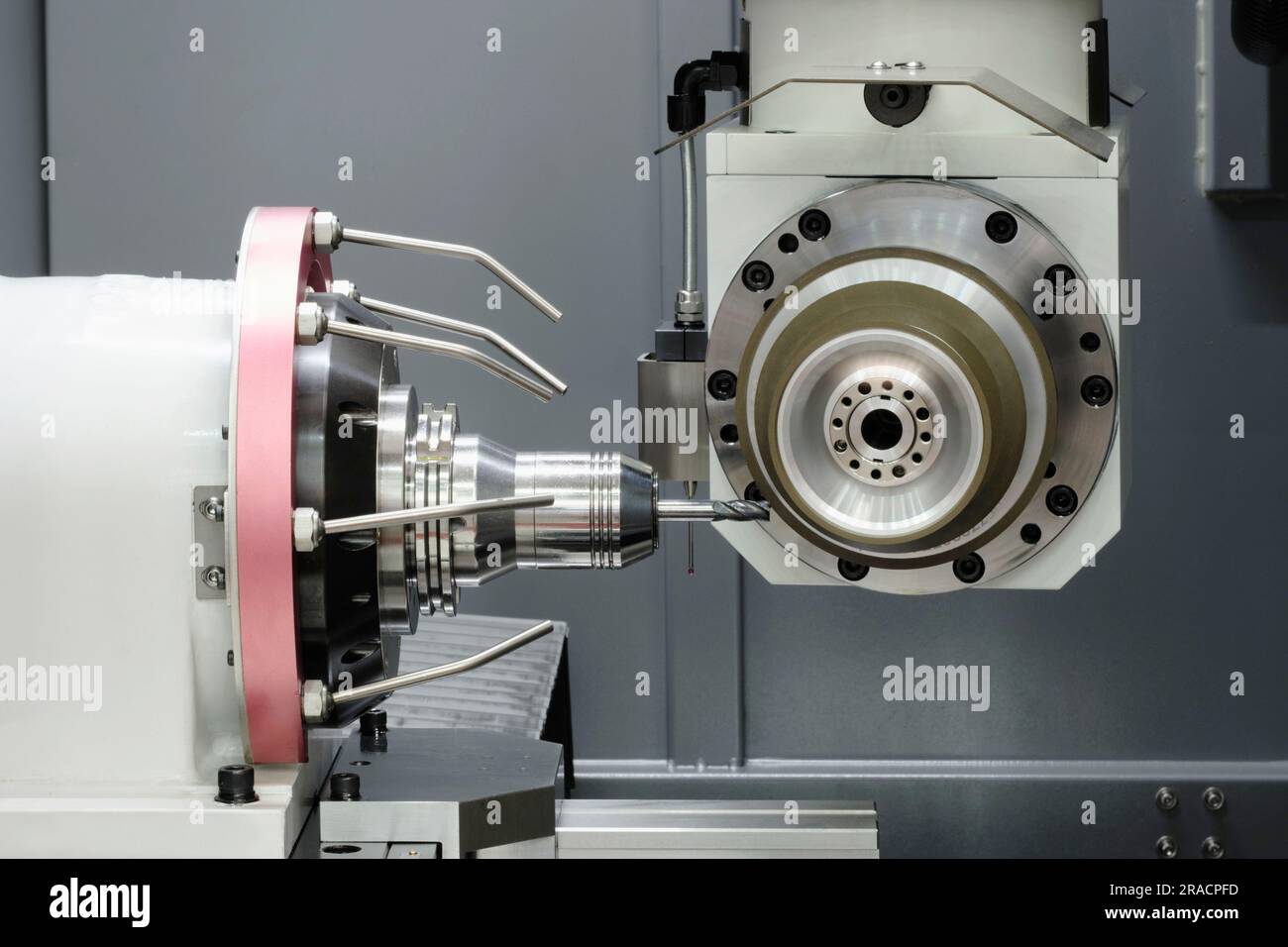 operator machining automotive parts by high precision machining center ...