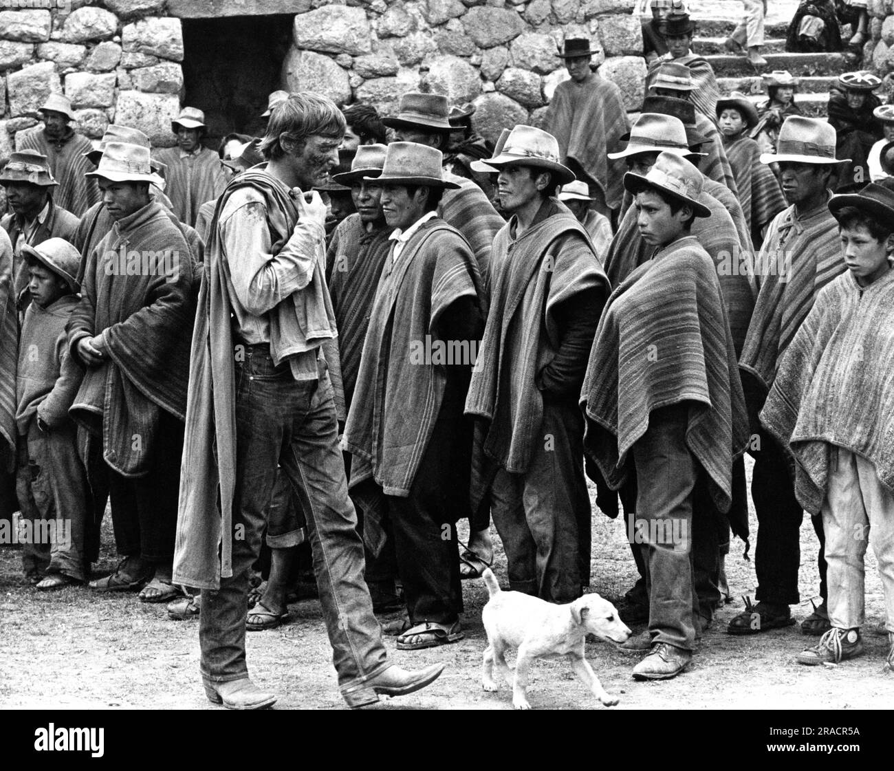 DENNIS HOPPER with a dog and Peruvian men and boys in THE LAST MOVIE