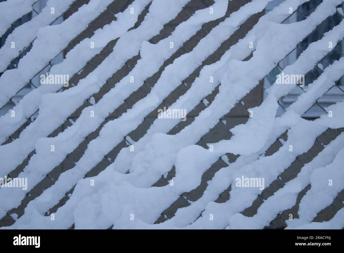 Wire mesh fence in snow hi-res stock photography and images - Alamy