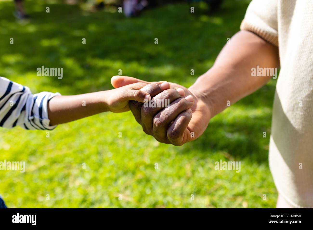 African father and son holding hands hi-res stock photography and ...