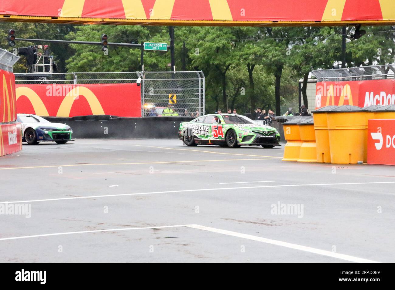The race cars do laps on the course of the NASCAR Cup Series Chicago Street Race in downtown Chicago on June 2, 2023