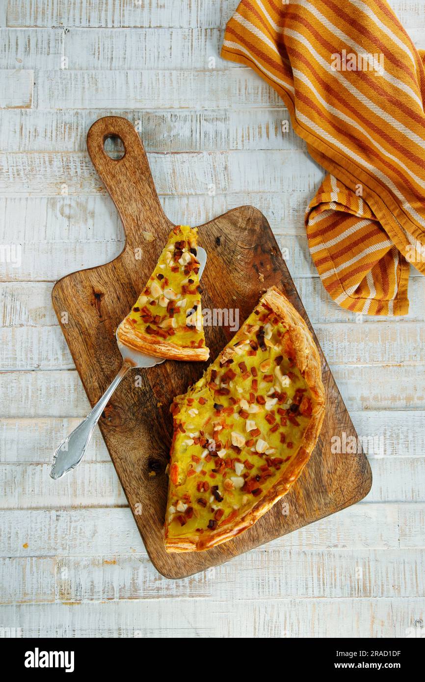 Potato and carrot quiche with bacon Stock Photo