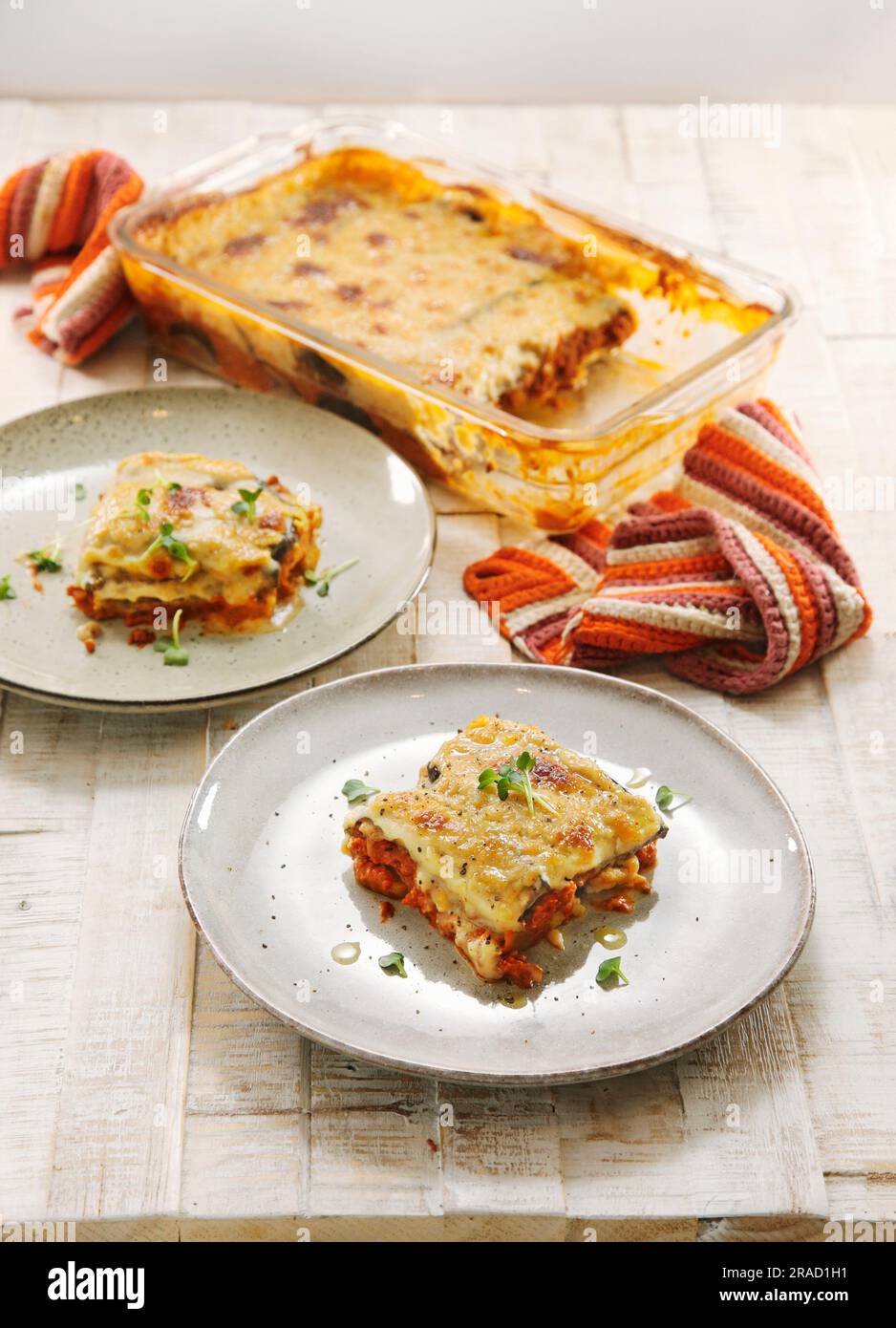 Summer moussaka with chickpeas on a light yellow background Stock Photo