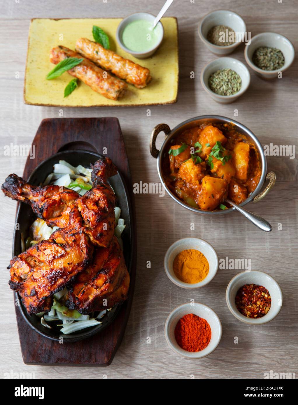 Tandoori chicken, kebab, and side dishes Stock Photo Alamy