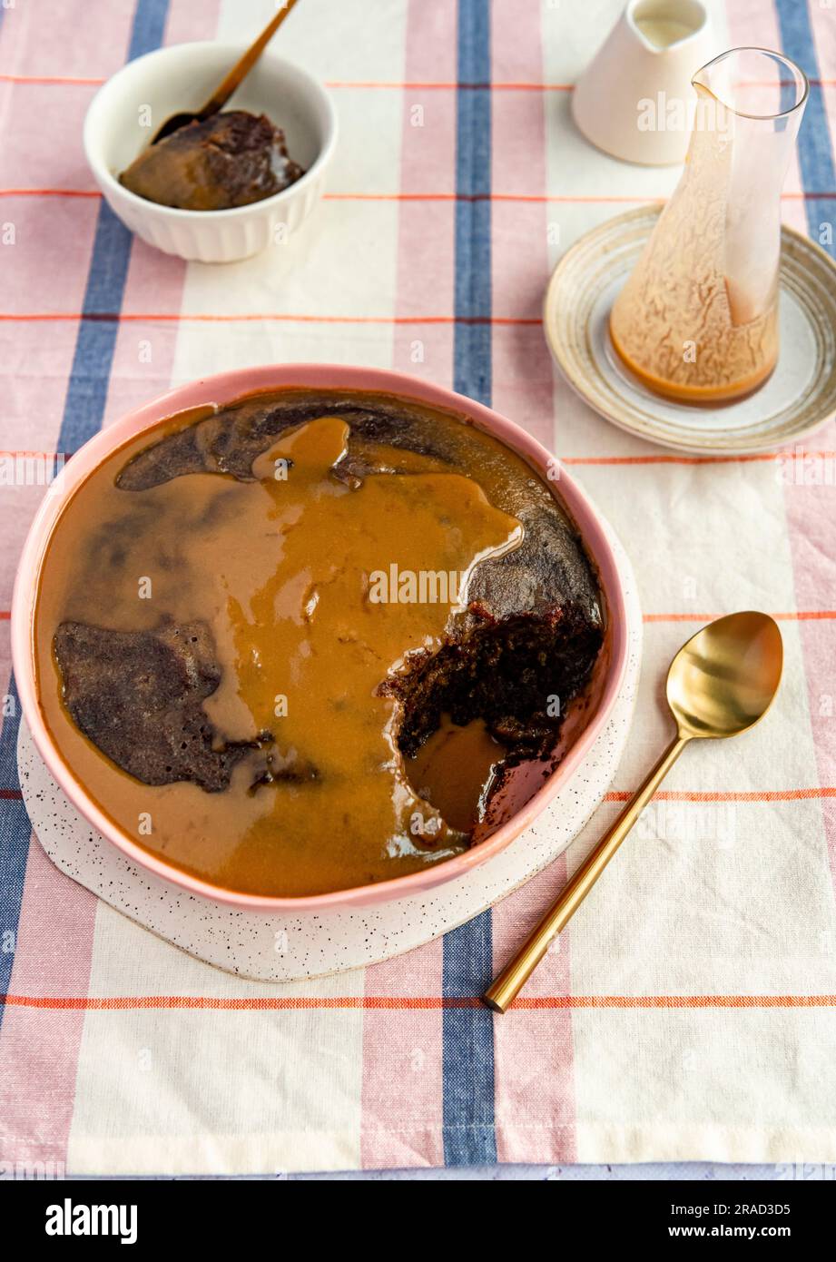 Sticky toffee pudding with coffee toffee sauce Stock Photo Alamy