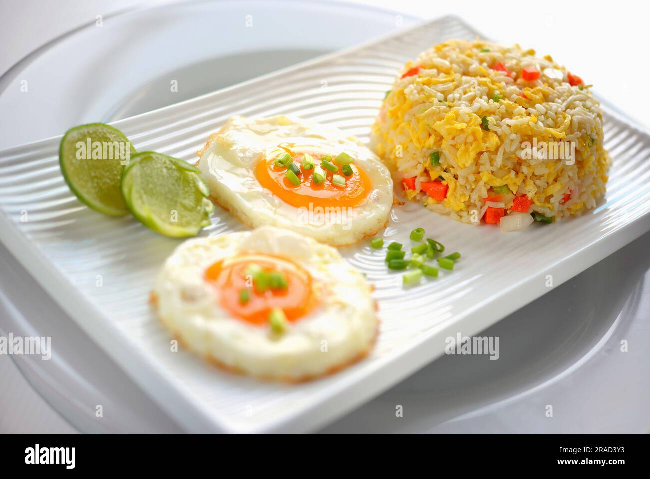 Vegetable rice tempura with fried eggs and lime Stock Photo Alamy