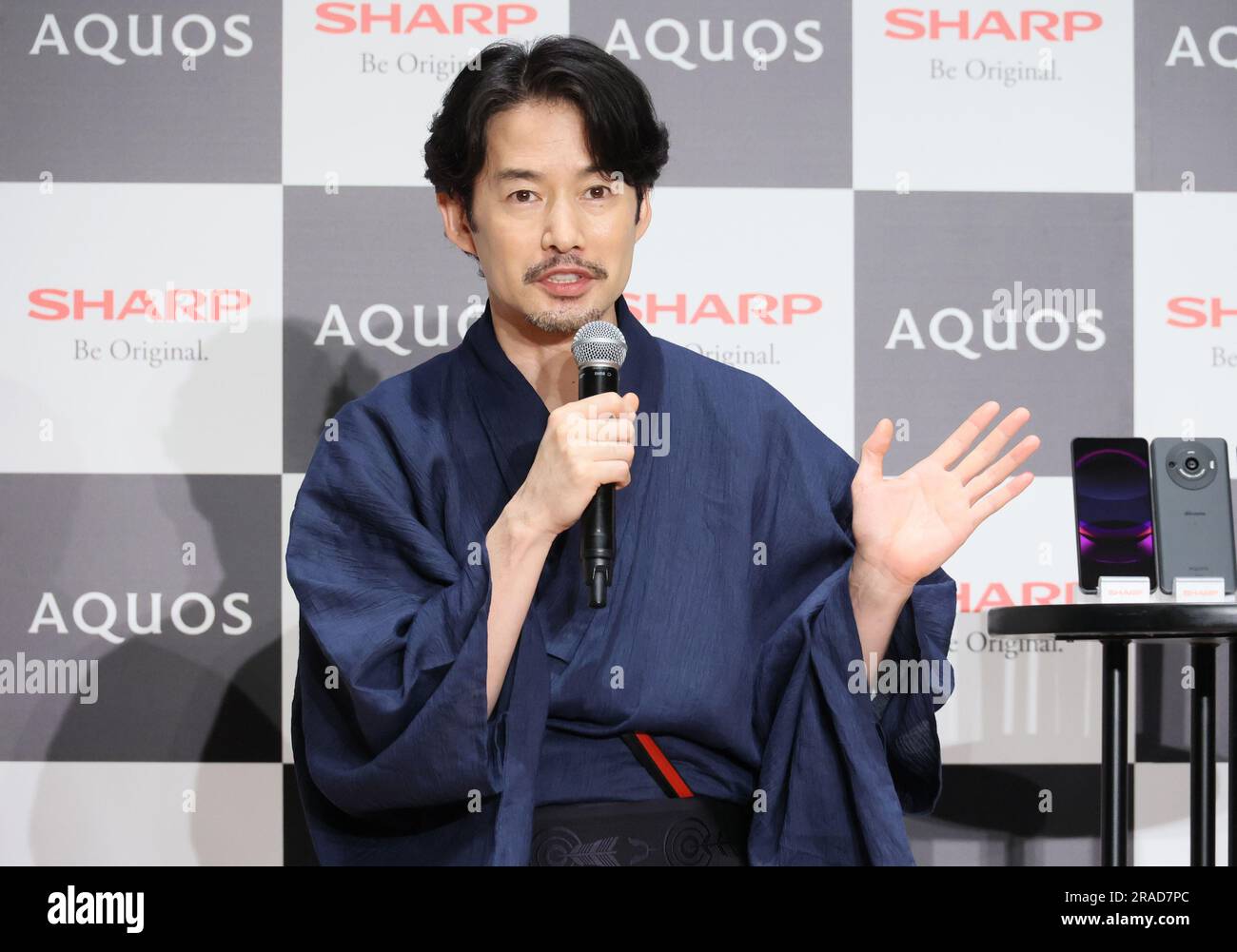 Tokyo, Japan. 3rd July, 2023. Japanese actor Yutaka Takenouchi attends a promotional event of Japanese electronics giant Sharp's smart phones "Aquos R8" and "Aquos R8 Pro" in Tokyo on Monday, June 3, 2023. Aquos R8 Pro has a 19mm/F1.9 lens with a One-inch CMOS image sensor and a 1 billion-color 6.6-inch OLED display. (photo by Yoshio Tsunoda/AFLO) Stock Photo