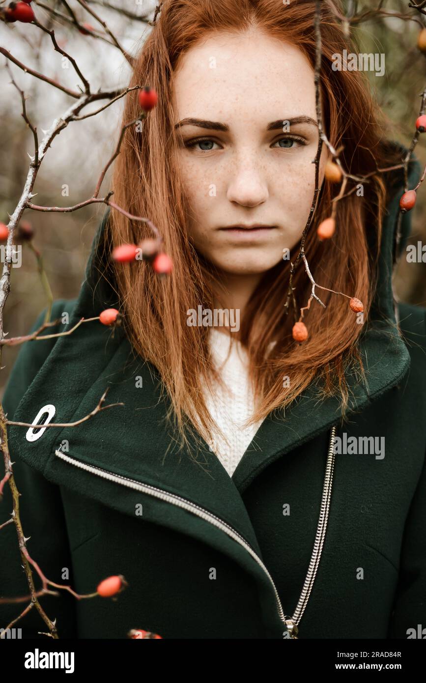 Close-up portrait of teenage girl with red hair Stock Photo