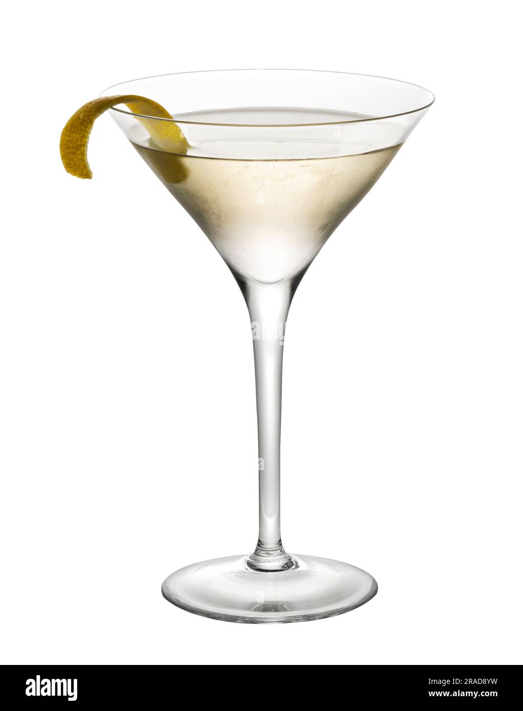 Delicious alcoholic Dry Martini cocktail in glass with lemon peel