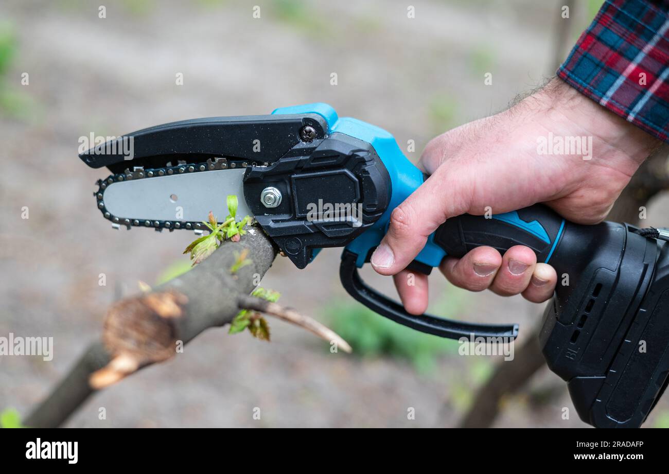 Electric saw battery hi res stock photography and images Alamy