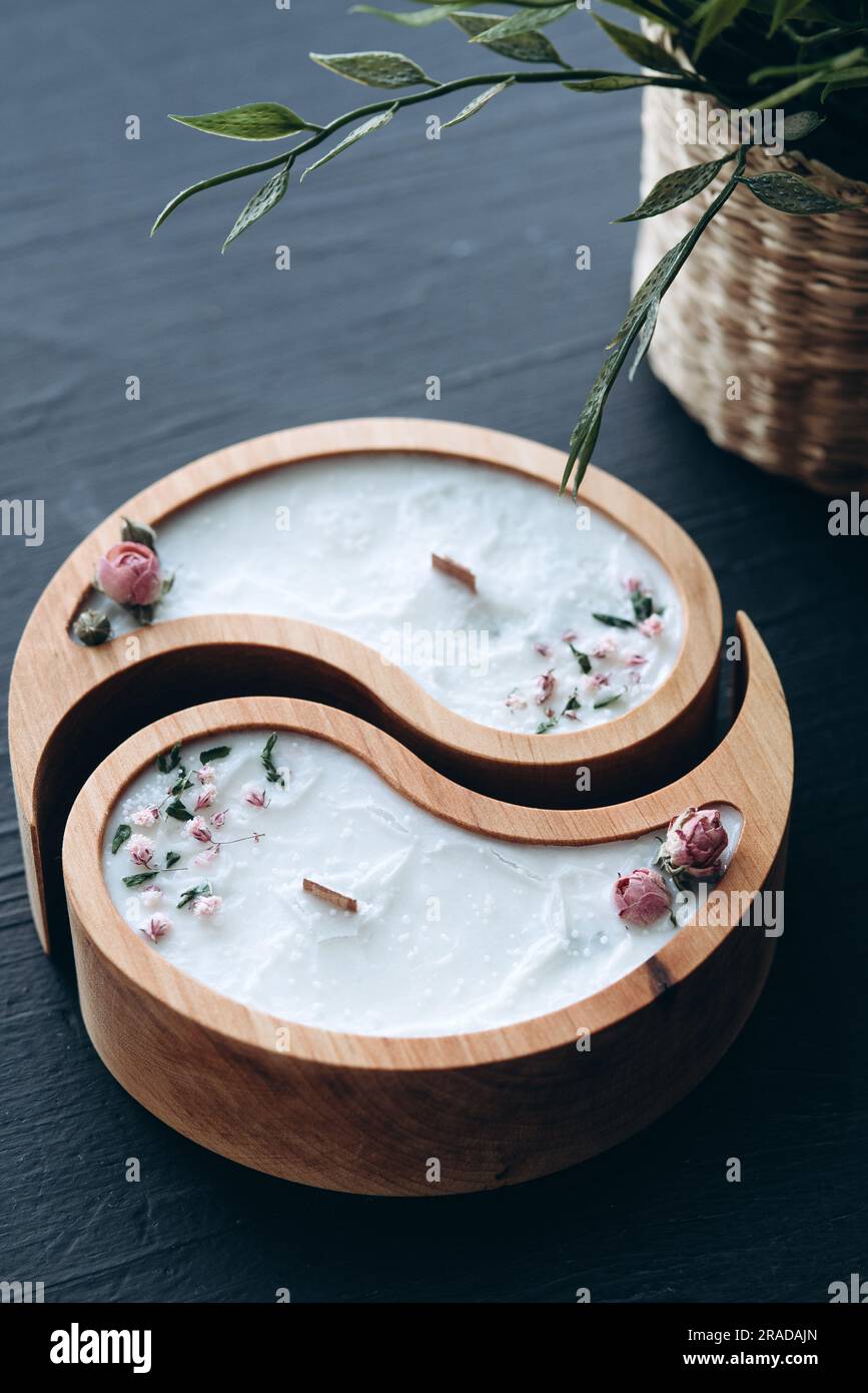 Hand-made concrete candles with dried flowers, scented soy wax vegan candles  Stock Photo - Alamy