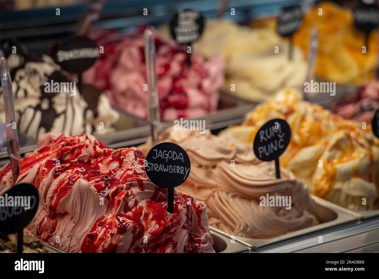 colourful flavoured ice cream on display in a refrigerated counter in