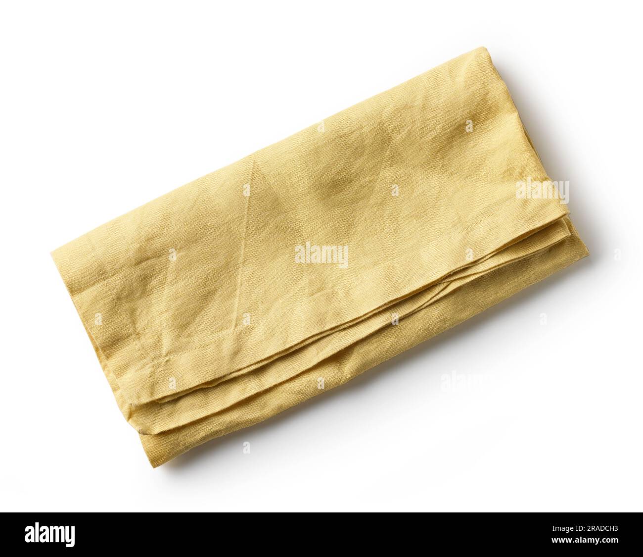 yellow folded cotton napkin isolated on white background, top view Stock Photo