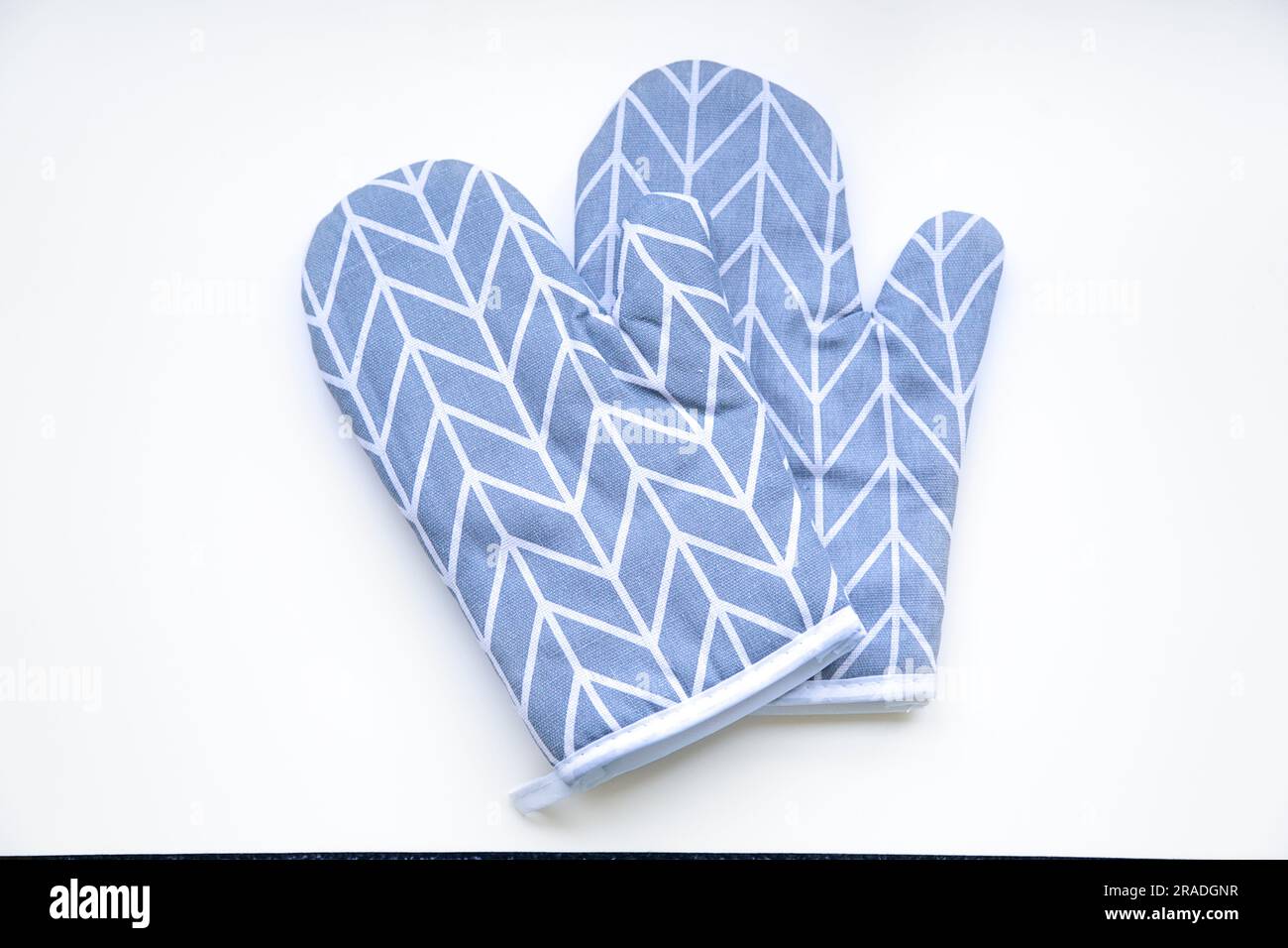 Two oven gloves isolated on white background Stock Photo