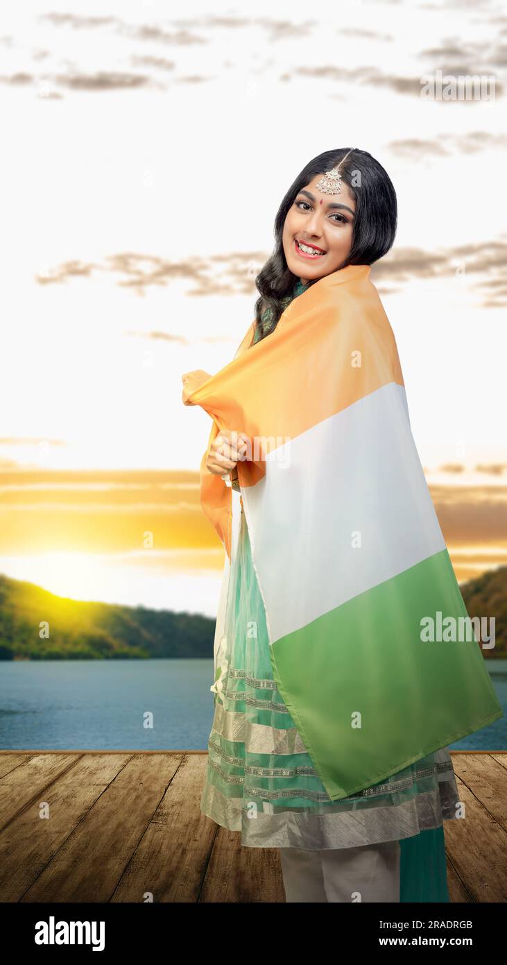 Indian woman holding Indian flag. India Independence Day concept Stock Photo
