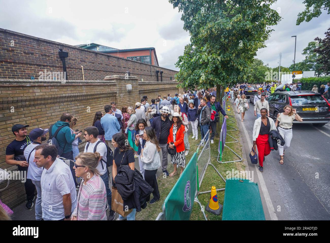 London UK. 3 July 2023 Long queues of tennis spectators outside the All England Lawn Tennis Club